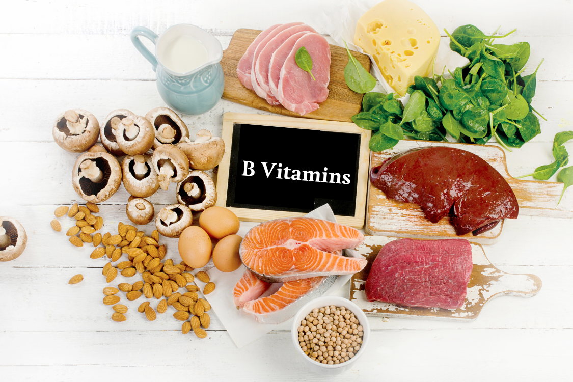 different types of B vitamin based foods including mushrooms, spinach, salmon, tuna, beef, cheese, eggs and chickpeas