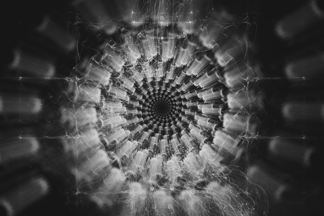 spiral from below in black and white showing the synergy of movement